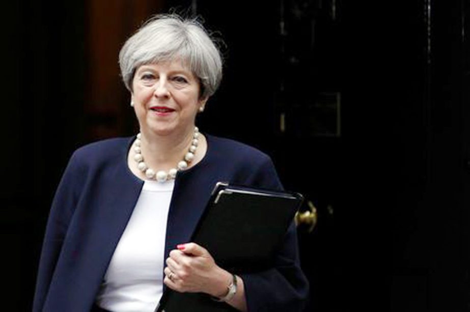 Britain's Prime Minister Theresa May remains in power despite failing to win an outright majority last month in an election she called.