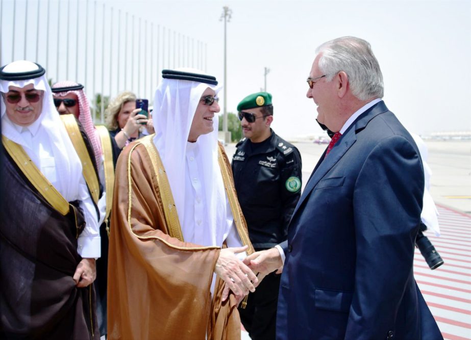 US Secretary of State Rex Tillerson is greeted by Saudi Foreign Minister Adel al-Jubeir upon his arrival in Jiddah, Saudi Arabia, on Wednesday.