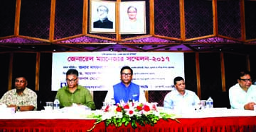 State Minister for Power Nasrul Hamid, among others, at distributing performance award at the GM Conference -2017 of Rural Electrification Board in the city on Saturday.