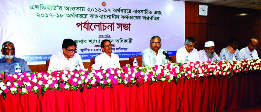 Chief Engineer of LGED Shyama Prosad Adhikari, among others, at the review meeting of different activities of 2017-'18 fiscal year under LGED at its auditorium in the city on Thursday.