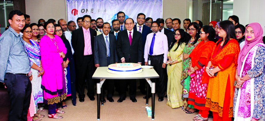 M Fakhrul Alam, Managing Director of ONE Bank Limited, celebrating its 18th Founding Anniversary at its head office in the city on Thursday. Senior Executives and employees of the bank were also present on the occasion.