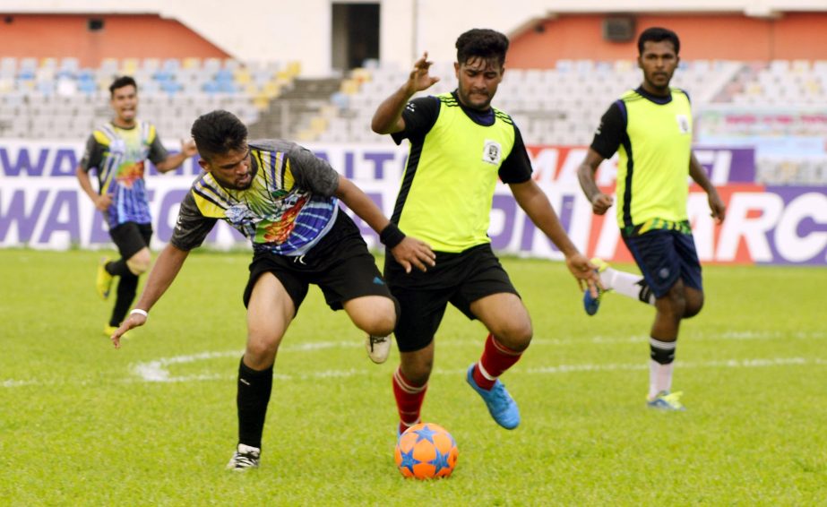 A moment of the match of the Walton 1st Inter-University Football Tournament between North South University and Bangladesh Textiles University at the Bangabandhu National Stadium on Monday.