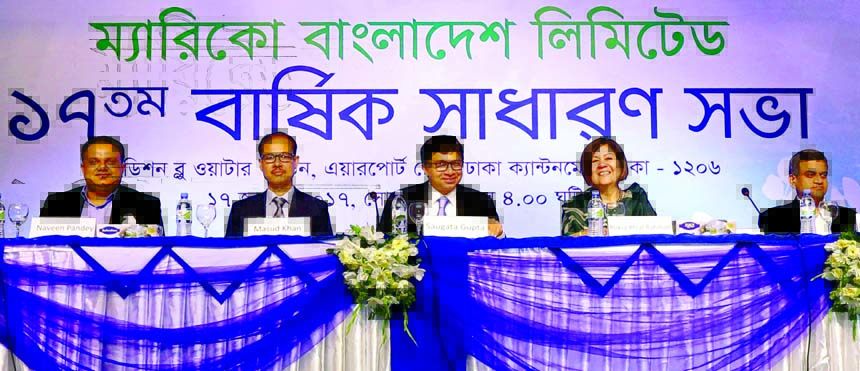 Saugata Gupta, Chairman, Board of Directors of Marico Bangladesh Limited, presiding over its 17th AGM at a city hotel on Monday. The AGM approved 50 percent cash dividend (equivalent to Tk 5 per share). Naveen Pandey, Managing Director, Rokia Afzal Rahma