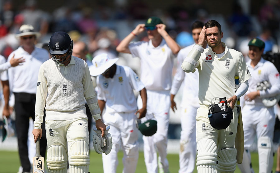 Swift end: England's final pair make their off after defeat on the 4th day of 2nd Investec Test against South Africa at Trent Bridge on Monday.