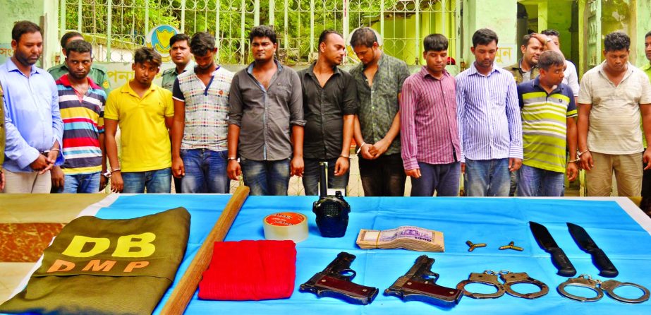 A special squad of plainclothes police nabbed 13 members of an organised robber gang from city's Jatrabari area and recovered firearms, bullets, handcuffs, knives and uniform of Detective Branch of Police on Tuesday.