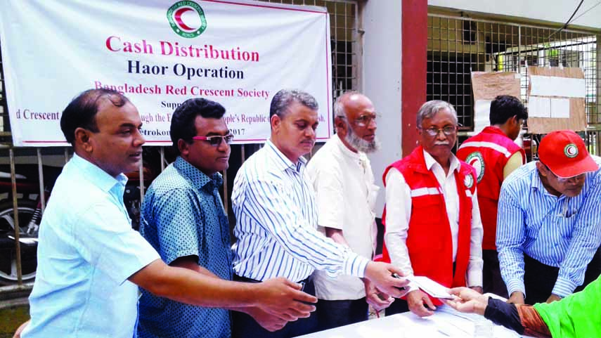 Bangladesh Red Crescent Society in cooperation with Netrakona Red Crescent Unit distributed Tk 4,000 in each member among the 342 families of flood victims on Wednesday.