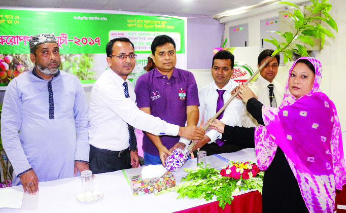 BHALUKA (Mymensingh): Mamun-ur-Rashid, Officer- in- Charge , Bhaluka Model Thana distributing saplings among the common people of the Upazila organised by Bangladesh Islami Bank, Bhaluka Branch on Tuesday.