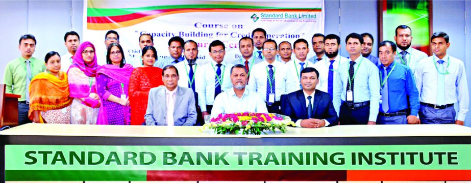 Mamun-Ur-Rashid, Managing Director of Standard Bank Limited, inaugurating a five day- long course on "Capacity Building for Credit Operation" at its Training Institute recently. Among others, Md. Zakaria, Principal and Md. Amzad Hossain Fakir, Faculty o