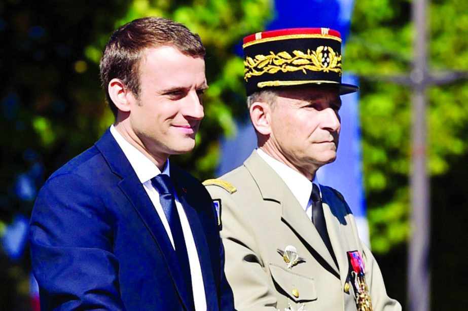 French President Emmanuel Macron (L) and Chief of the Defence Staff, French Army General Pierre de Villiers, pictured during the annual Bastille Day military parade on the Champs-Elysees in Paris.
