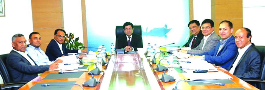 Barrister Sheikh Fazle Noor Taposh MP, EC Chairman of Modhumoti Bank Limited, presiding over its 59th EC meeting at the bank's head office on Thursday. Among others, Sharmin Group Managing Director Mohammad Ismail Hossain, Labib Group Chairman Salahuddi