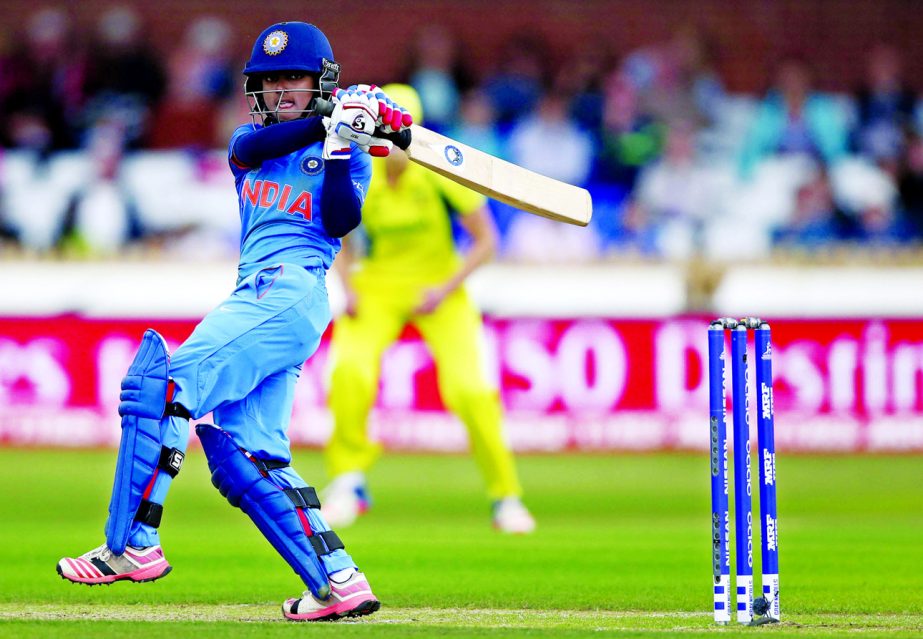 India's Harmanpreet Kaur plays a shot during the ICC Women's World Cup semifinal cricket match between India and Australia at the County Ground in Derby, England on Thursday.