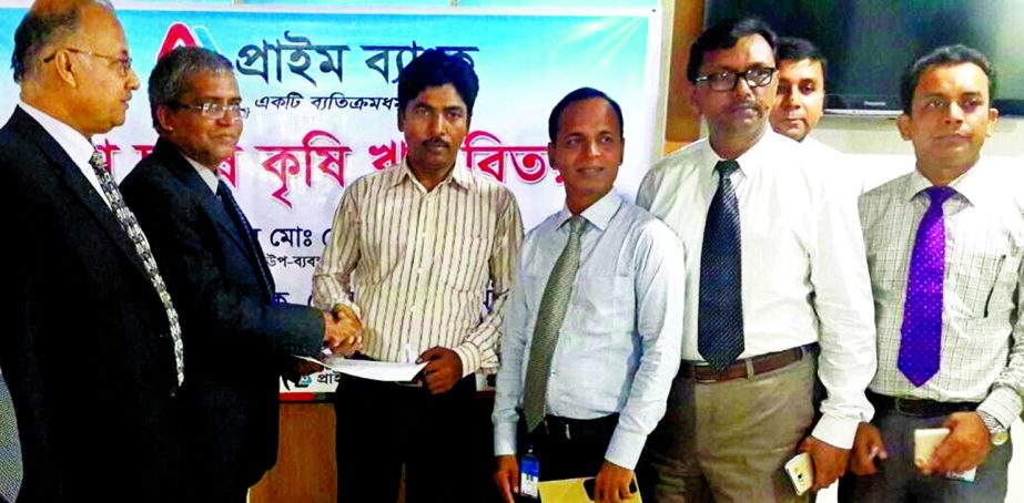 Md Touhidul Alam Khan, Deputy Managing Director of Prime Bank disbursing agriculture loan for cultivation of Banana in Kushtia through Poradah SME branch recently. Imtiaz Ahamed Bhuiyan, EVP, AKM Enamul Haque, VP and regional head of Rajshahi, Khan Md A