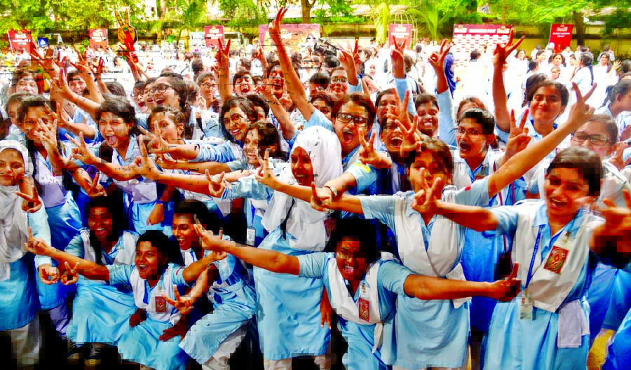 Students of Viqarunnesa Noon School and College celebrating their results on its campus after getting HSC results on Sunday.