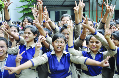 DINAJPUR: Students of Dinajpur Holyland College rejoicing HSC result as the college achieved cent percent pass yesterday.