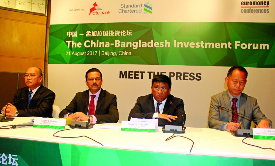 Sohail RK Hussain, Managing Director of City Bank Ltd, addressing at a press conference on 'The China-Bangladesh Investment Forum -2017' at a city hotel on Monday. Abrar A Anwar, CEO of Standard Chartered Bank Bangladesh, Li Guangjun, Economic and Comme