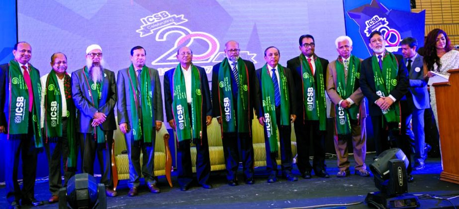 Commerce Minister Tofail Ahmed, poses with the participants of 20th Anniversary Celebration programme of the Institute of Chartered Secretaries of Bangladesh at Bangabandhu International Conference Centre in the city on Saturday. Shubhashish Bose, Secreta