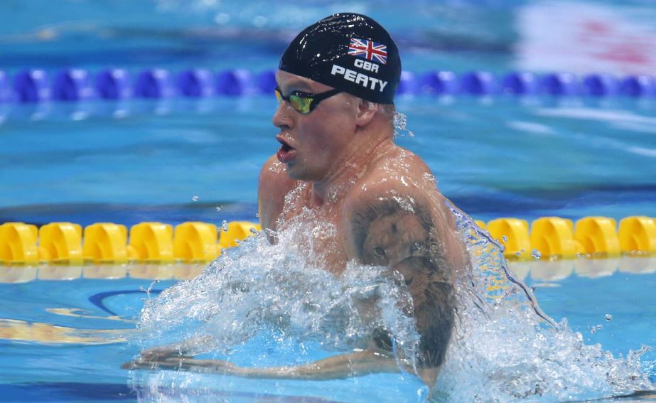 Britain's Adam Peaty swims when setting a new world record in a men's 50-meter breaststroke heat during the swimming competitions of the World Aquatics Championships in Budapest, Hungary on Tuesday.