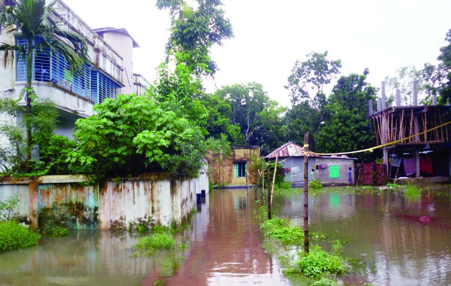 FARIDPUR: Major areas in Faridpur have been submerged due to rainfall for two days. This snap was taken from Roghunandonpur area on Tuesday.