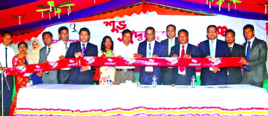 Masihul Huq Chowdhury, AMD of Midland Bank Limited, inaugurating its Agent Banking Booth at Palora Bazar, Batila Thana in Manikganj on Monday. Clients, businessmen and local elites were present.