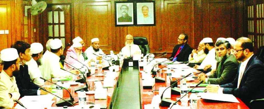 Sheikh Moulana Mohammad Qutubuddin, Chairman, Shariah Supervisory Committee of Islami Bank Bangladesh Limited, presiding over it's a meeting at the banks head office in the city on Monday. Dr. Mohammad Abdus Samad, Member Secretary of the Committee and M