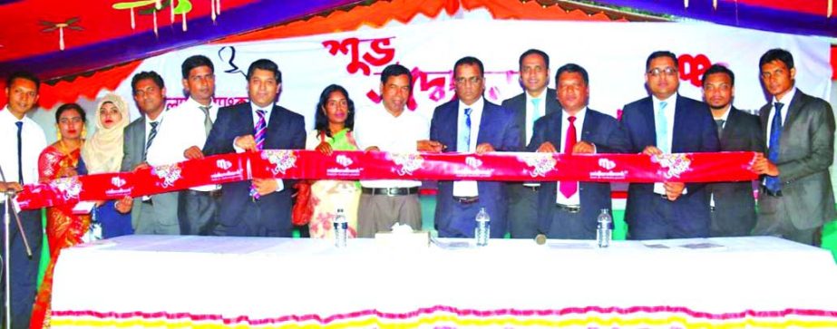 Masihul Huq Chowdhury, AMD of Midland Bank Limited, inaugurating its Agent Banking Booth at Palora Bazar, Batila Thana in Manikganj on Monday. Clients, businessmen and local elite were present.