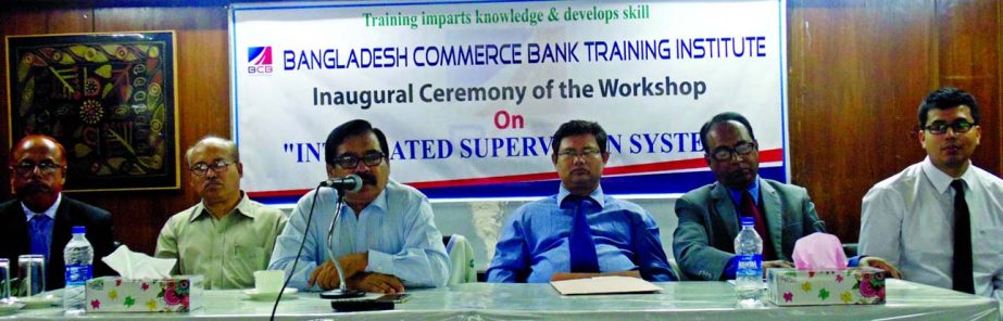 Kazi Rezaul Karim, Deputy Managing Director of Bangladesh Commerce Bank Limited, inaugurating a workshop on "Integrated Supervision System" for Managers' of Dhaka division at its training institute recently. RQM Forkan, Managing Director of the bank a