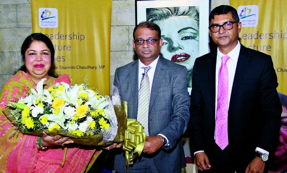 Ali Reza Iftekhar, Managing Director of Eastern Bank Limited, presenting a bouquet to Dr. Shirin Sharmin Chaudhury, Speaker of National Parliament for being a guest speaker of 'EBL Leadership Lecture Series' program at EBL Capacity Enhancement Center in