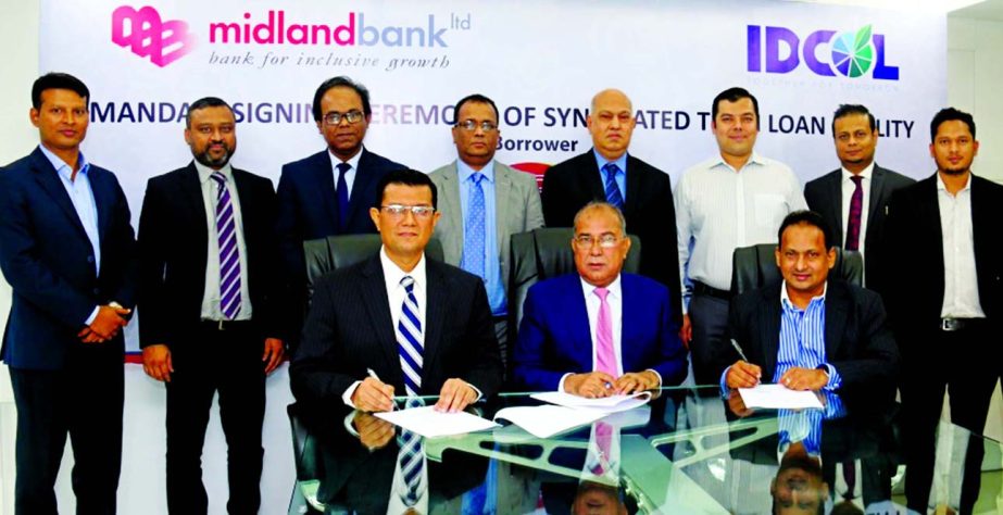 Md. Ahsan-uz Zaman, Managing Director of Midland Bank Limited, Mahmood Malik, Executive Director of Infrastructure Development Company Limited and Md Motiur Rahman, Managing Director of Kushiyara Auto Bricks Limited signing a tripartite agreement at the b