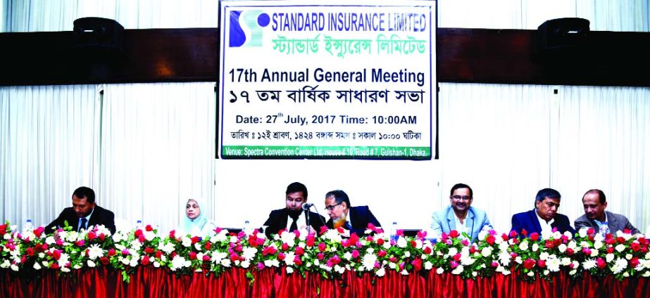 HTM Quader Newaz, Chairman of Standard Insurance Limited, presiding over its 17th AGM at a city convention center on Thursday. The AGM approves 10 percent dividend as bonus share for its shareholders for the year 2016. Mahmuda Begum, Engr. Shafiqul Haque