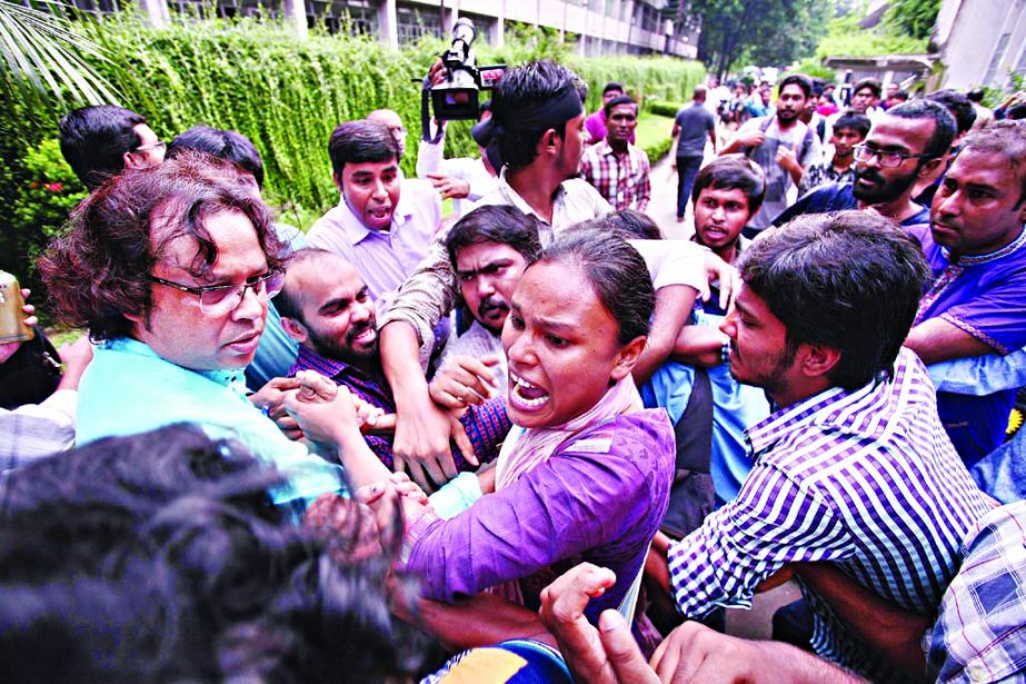 A scuffle broke out where some students of Dhaka University tried to enter the Nabab Nawab Ali Senate Bhaban along with the teachers as there was no representative from students for long for electing Vice-Chancellor. The photo was taken on Saturday.