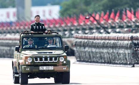 Chinese President Xi Jinping inspecting a military parade to commemorate the 90th anniversary of the foundation of China's People's Liberation Army (PLA) at Zhurihe military training base in Inner Mongolia Autonomous Region, China, on Sunday.