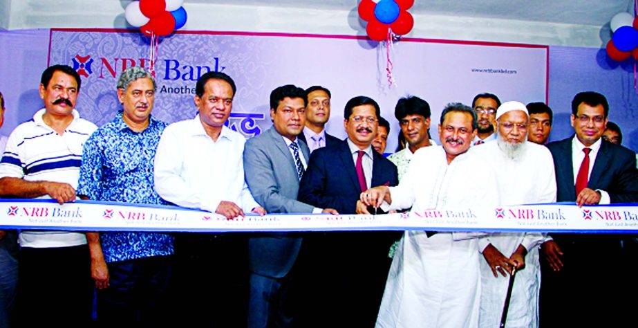 Mossadek Hossain Bulbul, Mayor of Rajshahi City Corporation, inaugurating the 26th Branch of NRB Bank Limited at Rajshahi on Sunday. Md. Mehmood Husain, Managing Director, Imran Ahmed, Chief Operating Officer, Rahat Shams, Head of Retail Banking of the ba