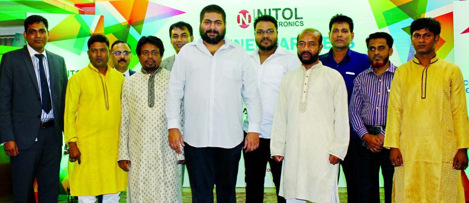 Abdul Musabbir Ahmad, Managing Director of Nitol-Niloy Group of Industries, poses with the participants of the '2nd channel partner conference' of Nitol Electronics Ltd at its head office on Friday. Arup Kumar Chaki, CEO, Zahir Raihan, Head of Sales of