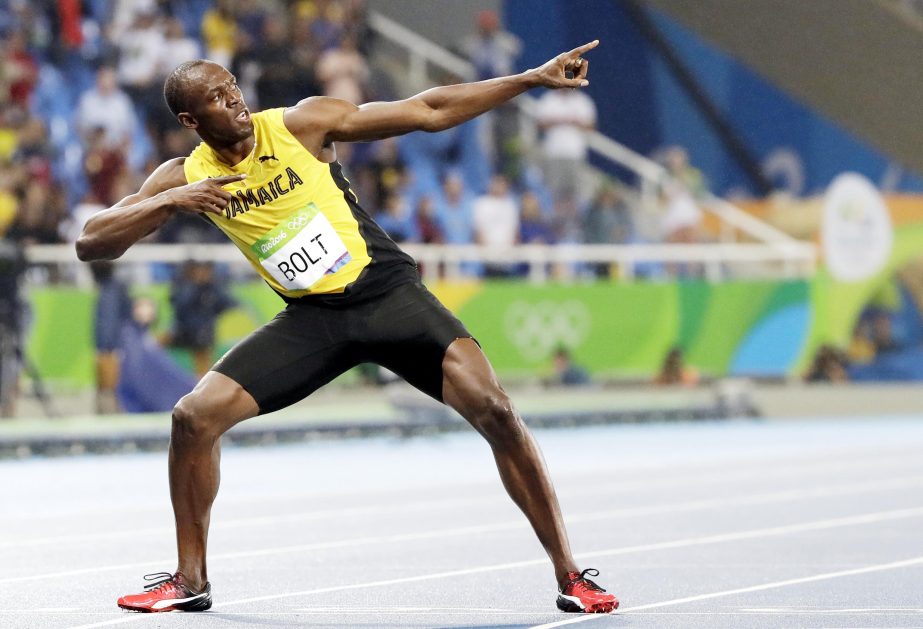 FILE - In this Aug. 18, 2016, file photo, Usain Bolt celebrates winning the gold medal in the men's 200-meter final during the athletics competitions of the 2016 Summer Olympics at the Olympic Stadium in Rio de Janeiro, Brazil. The man who reshaped the r