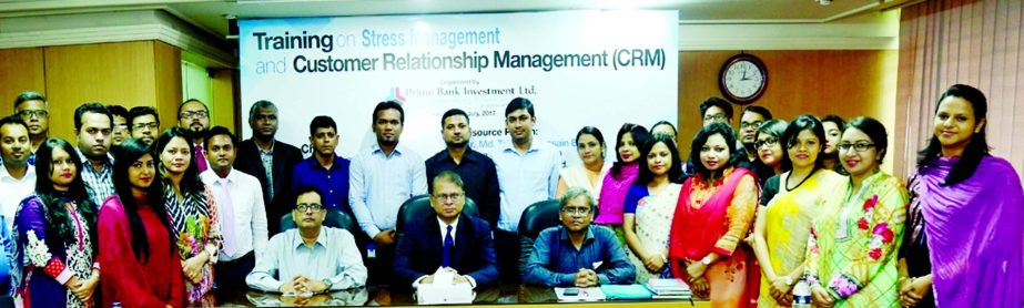 Shamsuddin Ahmed, Ph.D, Chairman of Prime Bank Securities Limited, poses with the participants of two-day long training sessions on "Customer Relationship Management, Spiritual Laws of Success, Time Management and Stress Management' at the bank's train