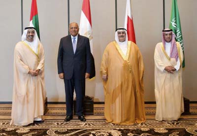 Foreign Ministers of UAE Abdullah bin Zayed al-Nahyan, Egypt's Sameh Shoukry, Bahrain's Khalid bin Ahmed al-Khalifa and Saudi's Adel al-Jubeir, pose for a photo during their meeting in Manama, Bahrain.
