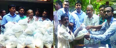 SYLHET: Ali Ahmed, General Secretary, Sylhet District BNP distributing relief materials among the flood victims at Fenchuganj Upazila donated by Safi Ahmed Chowdhury MP recently.