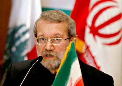 Iranian Parliament Speaker Ali Larijani speaks during a news conference in Beirut.