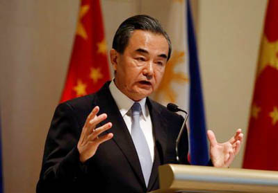 China's Foreign Minister Wang Yi speaks during a joint news conference with his Philippine counterpart Foreign Affairs secretary Alan Peter Cayetano (not pictured) in Taguig, Metro Manila Philippines