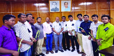 RANGPUR: VC of BRU Prof Dr Nazmul Ahsan Kalimullah seen with new executive members of 'Neel Dal' , a teachers' association of the University at his office on the campus on Thursday.