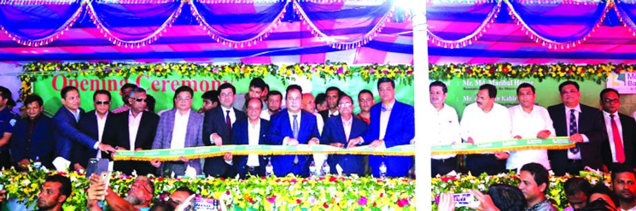 Md Mazibul Hoque, Railways Minister, inaugurating the 26th branch of Modhumoti Bank Limited at Konkapoit, Comilla on Thursday. Abdullah Al Islam Jakob, MP, Deputy Minister for Environment and Forests Ministry, Humayun Kabir, Chairman, Shaikh Salahuddin, V