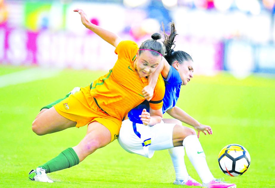 Australia's Caitlin Foord (left) and Brazil's Leticia battle for the ball during the second half of a Tournament of Nations soccer match on Thursday in Carson, Calif. Australia won 6-1.