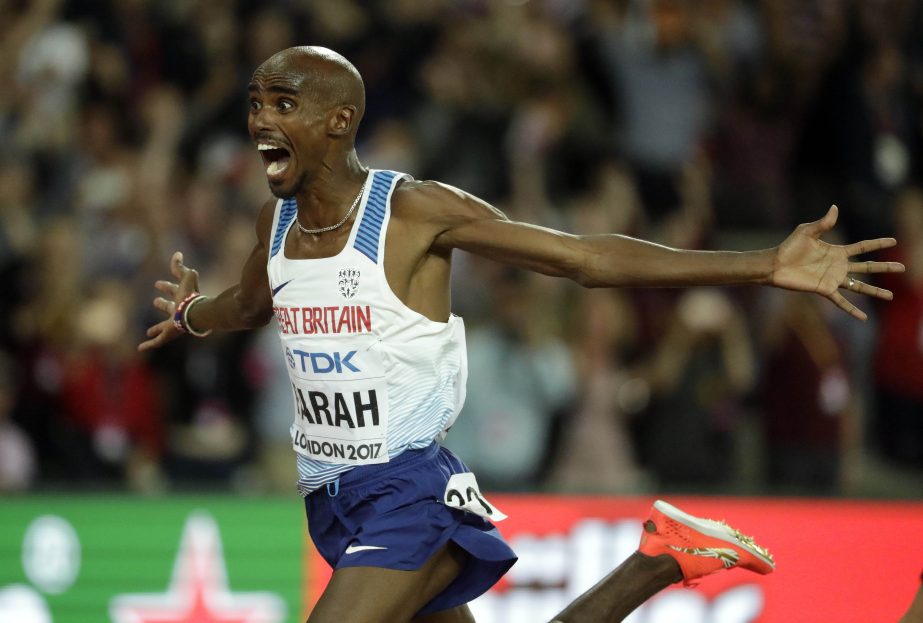 Britain's Mo Farah crosses the line to take the gold in the men's 10,000-meter final during the World Athletics Championships in London on Friday.