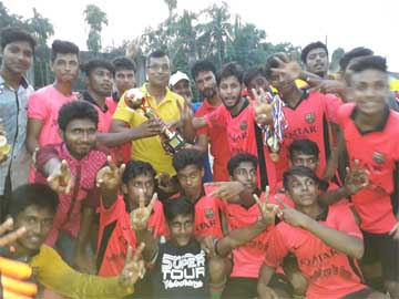 Members of Singair Model Pilot High School team, the champions of the Football Tournament of the Upazila level of the 46th Bangladesh National School & Madrasha Summer Sports Competition pose for a photo session at Singair in Manikganj on Sunday. Banglade