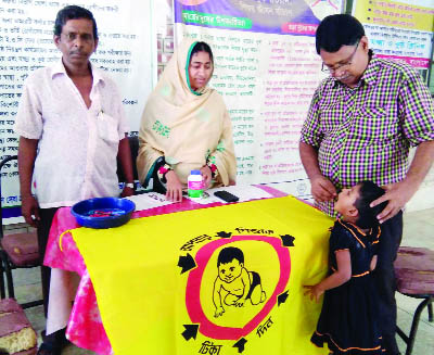 SAPAHAR(Naogaon):Dr Mominul Huq, Health and Family Planning Officer, Upazila Sapahar inaugurating Vitamin A Plus Campaign on Saturday.