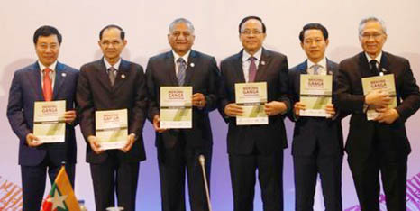 India's Minister of State for External Affairs Shri V. K. Singh (3rd-L) and ASEAN foreign ministers hold communique documents during the Mekong-Ganga Ministerial meeting of the 50th Association of Southeast Asia Nations (ASEAN) Regional Forum (ARF) in Ma