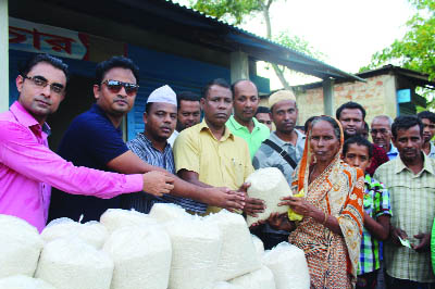KULAURA(Moulvibazar): Leaders of United Royals' Club, Kulaura distributing relief among the flood-hit people at Joychondi Union on Friday. Md Mosabbir Ali, General Secretary, Moulvibazar District Journalists' Forum was present as Chief Guest.