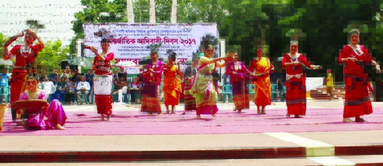 Artistes performing dance at the Central Shaheed Minar on the occasion of International Indigenous Day yesterday.