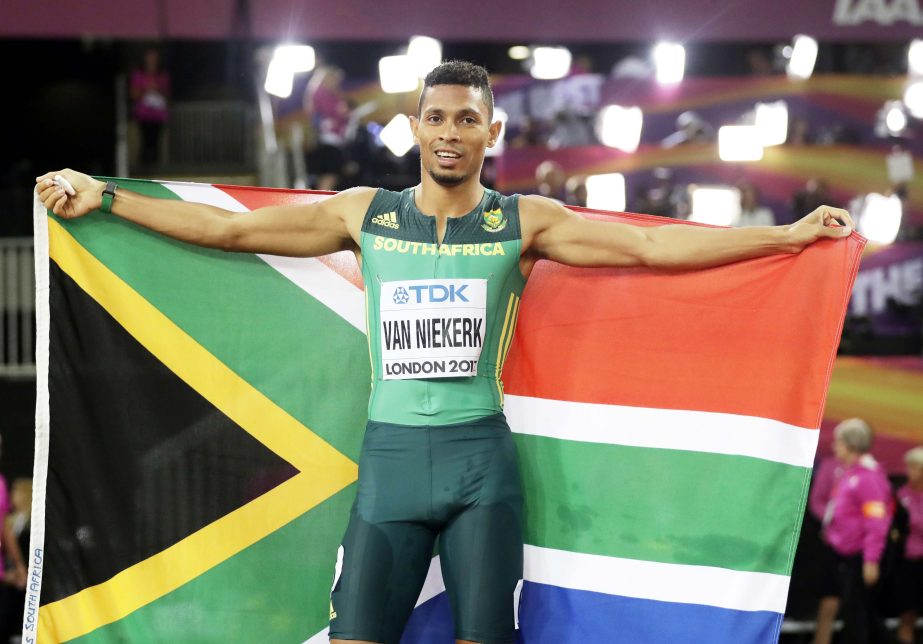 South Africa's Wayde Van Niekerk celebrates after winning the gold medal in the men's 400-meter final during the World Athletics Championships in London Tuesday.