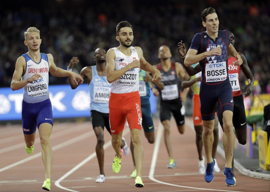 France's Pierre-Ambroise Bosse (right) crosses the line to win the gold medal in the Men's 800m final ahead of Poland's Adam Kszczot during the World Athletics Championships in London on Tuesday.